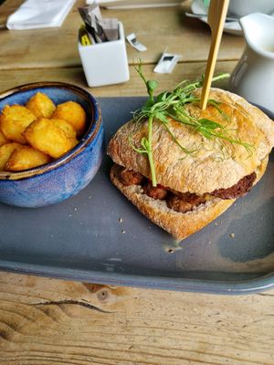 Sausage and Smokey bacon breakfast sandwich with potato roastis at Super Natural Newcastle in Newcastle Upon Tyne