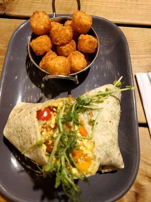 Breakfast Wrap with a Pot of Rosti Bites at Super Natural Newcastle in Newcastle Upon Tyne