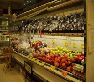 Fresh produce case. Local items are labeled as such. at Nature's Pantry in State College