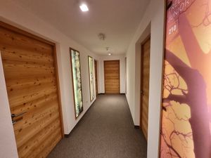 Doors to rooms in hotel at La Vimea - Vegan Hotel & Vegan Restaurant in Naturno