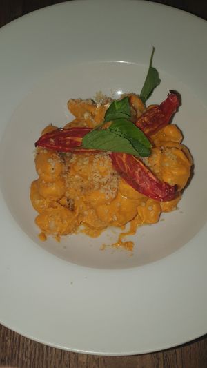 Exquisito Gnocchi de quinoa con pesto siciliano at Gioia Plant-Based Cuisine in Marbella