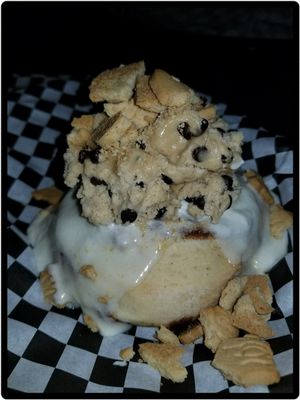 Cinnamon roll with cream cheese frosting, cookie dough, and graham crackers.  at Cinnaholic in Atlanta