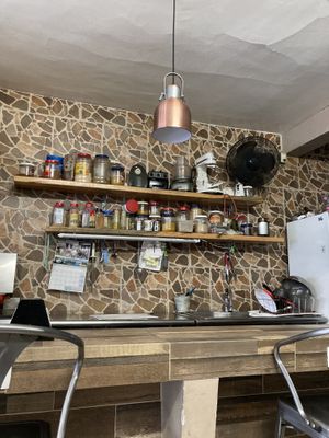 Open kitchen with spices  at Jerusalem Express - Food Stand in Puerto Vallarta