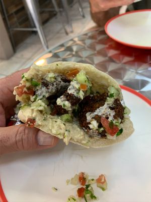 Fresh ingredients. Delicious falafel pita wrap! Happy people. What mor can one ask for?!  at Jerusalem Express - Food Stand in Puerto Vallarta