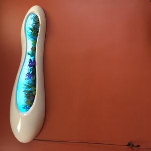 Cool space-age wall decor. Totally out of place, but awesome. at Sri Dosa Place in Iselin