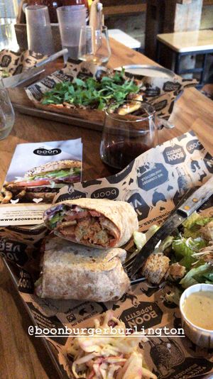 Buffalo Deluxe wrap/side Caesar/Animal Lovers pizza. 13th Street Winery.  at Boon Burger Cafe in Burlington