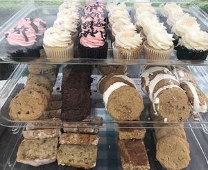 Mixture of goodies at a Farmers Market - All GF & Vegan at Sinful Confections in Portland
