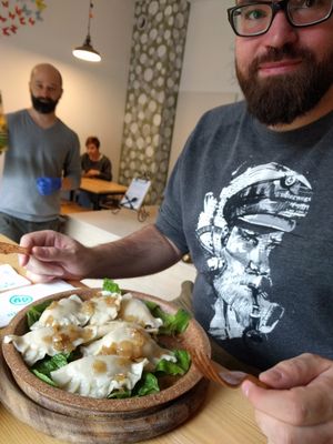 Wenn ate the piroggi with potato/parsley filling. The owner told us that the Plate can be eaten, too. at Evka Vegebar in Swinoujscie