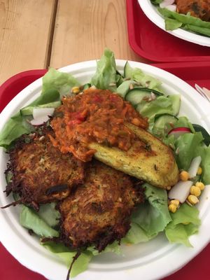 Salad with potato hash, savoury potato roulade, goulash. All very tasty!  at Evka Vegebar in Swinoujscie