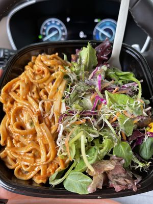 “Popular Choice” Salad topped with their peanut like noodles   at Macro Mamas in Ithaca