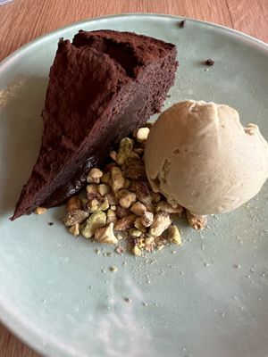 Chocolate cake with homemade pistachio ice cream  at The Green Spot in Barcelona
