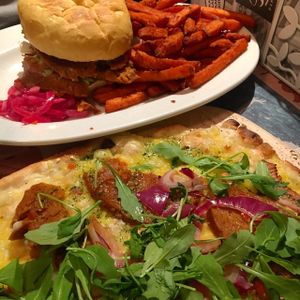 Seitan flambee (vegan and so so good) and a seitan burger. at Sävel in Helsinki