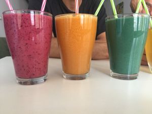 Berry smoothie, ginger and orange juice, spirulina smoothie at Rawdia in Brasov