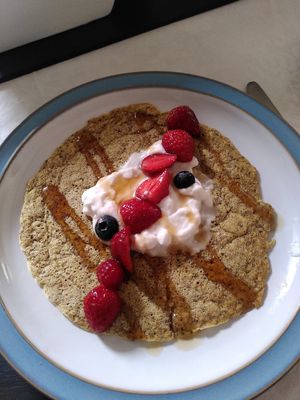 Delicious vegan pancakes with fresh strawberries from the garden at Graianfryn Guest House in Penisar Waun