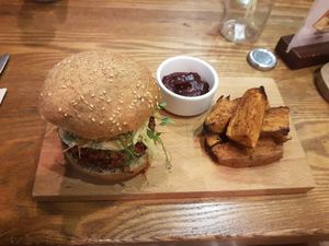 The Boss Burger with sweet potatoe fries and beetroot sauce at Evergreen Organics in Doha