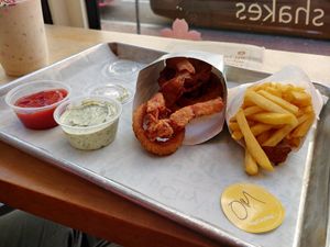 Onion rings and fries, small portion sizes. at HipCityVeg - 7th St in Washington