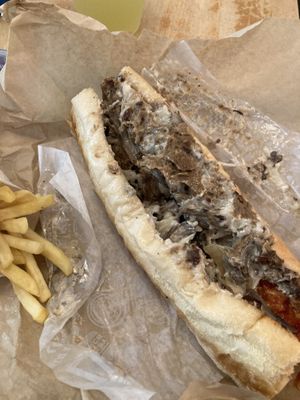 Philly cheesesteak and fries  at HipCityVeg - 7th St in Washington