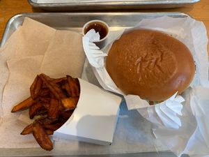 Sweet potato fries, bbq sauce and “chicken” burger  at HipCityVeg - 7th St in Washington