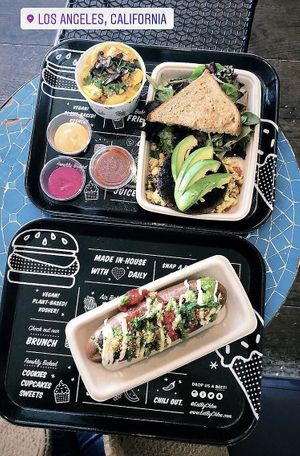Breakfast sandwich and Mac and cheese (top) meatball sub (bottom) at By Chloe in Los Angeles