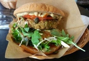 Gorenc Burger with all possible sauces ;) and green onions at Zaziv Vegan Bistro in Ljubljana