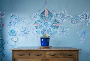 In the Agua Room, painted by Kai Ignetas, a.k.a Chi Tree Sign. At night, turn on the UV lamp and discover a whole new world on the walls... at FireJuice in Amsterdam