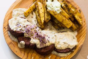 Chorizo with chimichurri potatos. Delicious. at Yanten Veggie Bar in Madrid
