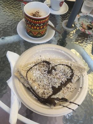 Vegan Crêpe with dark chocolate and brown chai latte with oat milk  at Joya Canti di Stagione in Polignano A Mare