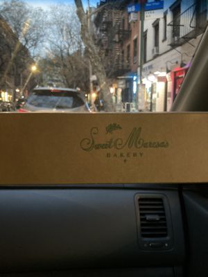 stamped logo on vegan macaron box.   at Confectionery! in New York City