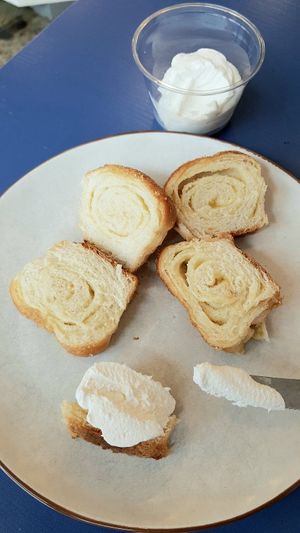 Sweet potato roll bread with whipped cream at Haemil Bakery in Seoul