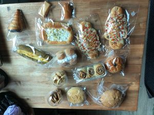 Our collection of baked goods. We were on the go the next few days of our trip, and it actually kept well for about 2 days. We ate the refrigerated/ones with cream in them first. at Haemil Bakery in Seoul