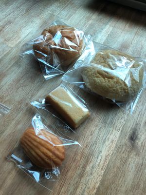 Lots of nice sweet options! In the back there is two buns - a redbean bun and a walnut bun. (He gave us the walnut bun free and the loaf in the middle - cant remember what it is!) at Haemil Bakery in Seoul