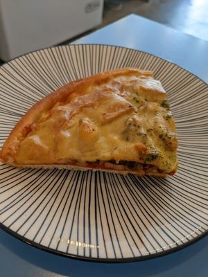 Vegan pizza slice at Haemil Bakery in Seoul