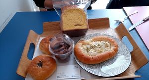 Red bean bun, pumpkin loaf, choc cookies and onion mayo bread. at Haemil Bakery in Seoul