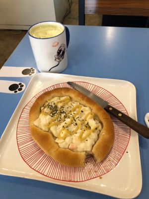 matcha latte and onion and cheese bread? i think  at Haemil Bakery in Seoul