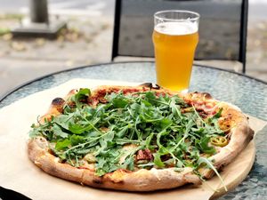 vegan pizza with rucola, jalapeños, sun dried tomatoes and mushrooms at Pizza di Ascari in Vilnius