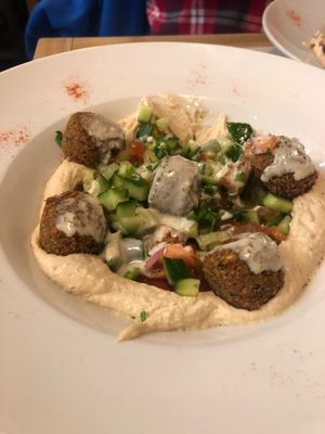 Falafel plate my friend started before I took the photo   at Cohen's Smartfood in Vienna