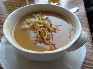 potato soup with shoestring potatoes and parsley (vegan) at Die Kartoffel in Saarbrucken