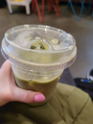 Matcha latte with oat milk at Brooklyn Whiskers - Broadway in Brooklyn