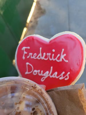 Cookie for black history month and iced chai latte at Brooklyn Whiskers - Broadway in Brooklyn