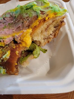 I WON! Sometimes they hide a toy in the king cake and when u buy a slice you could find it inside.  Can't believe I got it! (I did try a lot in the past..) at Brooklyn Whiskers - Broadway in Brooklyn