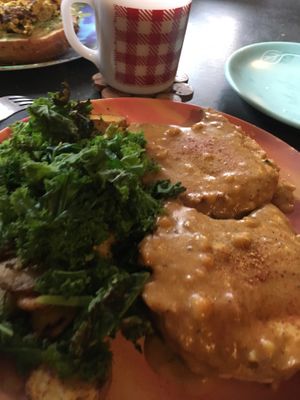 Biscuits and gravy with kale and potatoes at Brooklyn Whiskers - Broadway in Brooklyn