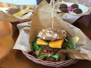 quinoa cheeseburger, hummus with falafel, classic pita at Mango Vegan Street Food - Zlota in Warsaw