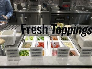 Salad and finishing toppings at Beefsteak - Tenleytown in Washington