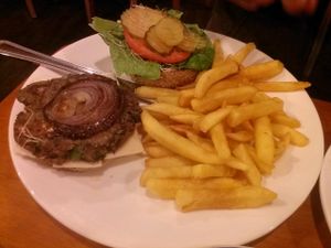 Black bean burger with fries..very bland. at TVJ Kitchen - West LA in Los Angeles
