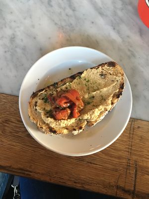 Vegan hummus toast with herbed oil and roasted red pepper. Small but tasty! at Kaffihus Vesturbæjar in Reykjavik