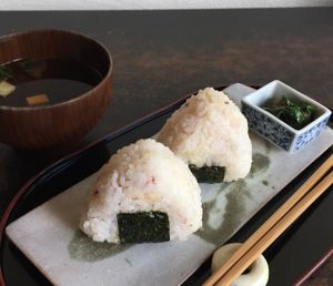 Onigiri Rice Ball Vegan Set:

2 Onigiri served with a Japanese style Vegan soup. at Cafe Frosch in Kyoto