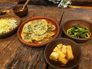 Pancakes and some of the banchan at Dasoni in Jeju