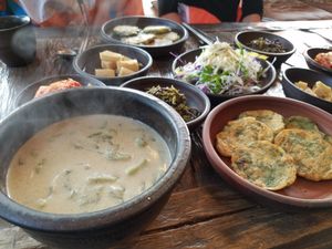 Perilla seed soup and banchan at Dasoni in Jeju