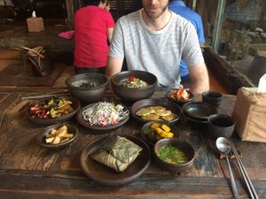 our feast! lotus leaf rice, buckwheat noodle soup, yeolmuguksu, and side dishes at Dasoni in Jeju