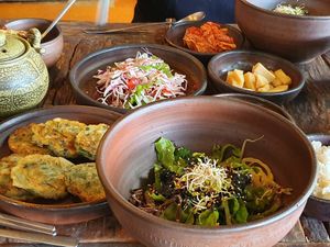 Bibimbap with side dishes at Dasoni in Jeju